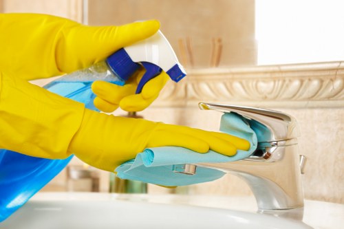 Staff using protective gear during professional carpet cleaning