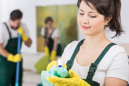 Safety-focused carpet cleaning team assessing a room before work